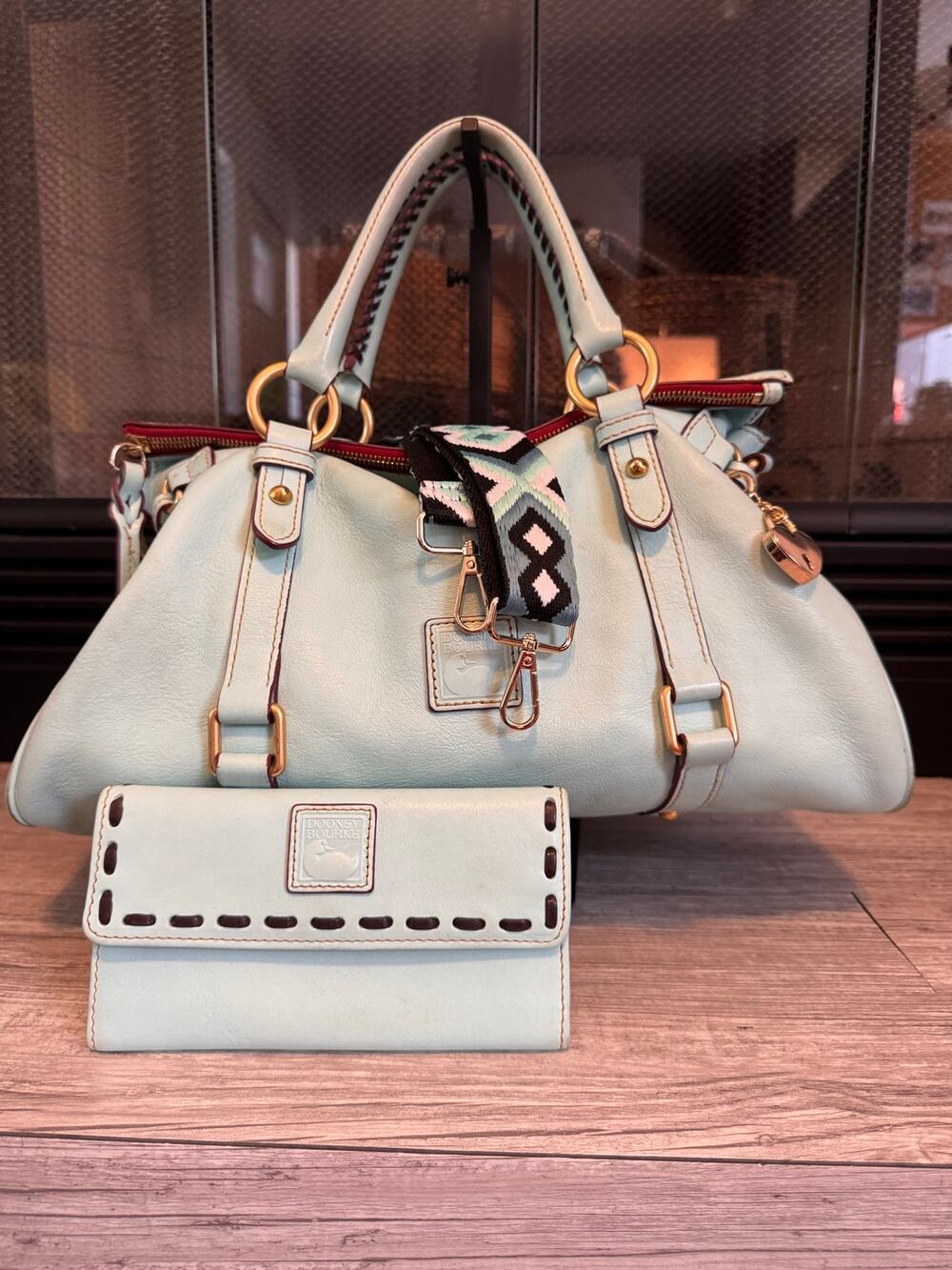 Older style 15 inch Dooney & Bourke Aqua Florentine leather satchel with wallet